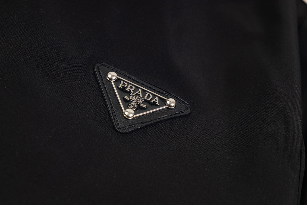 Stand-up collar jacket with metal logo jacket